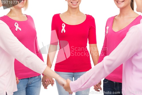 Image of close up of women with cancer awareness ribbons