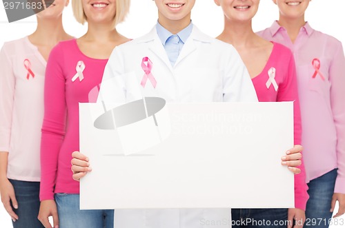 Image of close up of women with cancer awareness ribbons