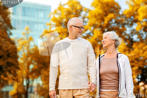 Image of senior couple in city park