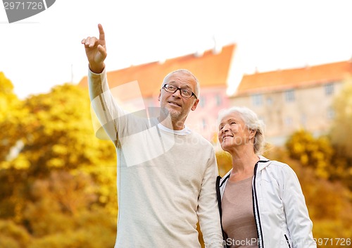 Image of senior couple in city park