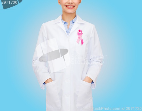 Image of close up of doctor with cancer awareness ribbon