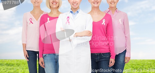 Image of close up of women with cancer awareness ribbons