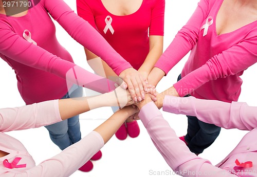 Image of close up of women with cancer awareness ribbons