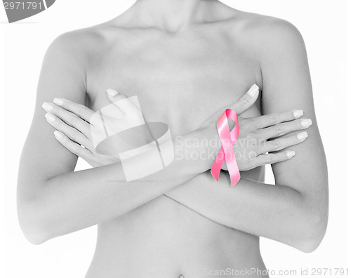 Image of naked woman with breast cancer awareness ribbon