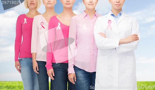 Image of close up of women with cancer awareness ribbons