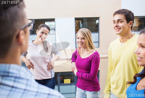 Image of group of smiling students outdoors