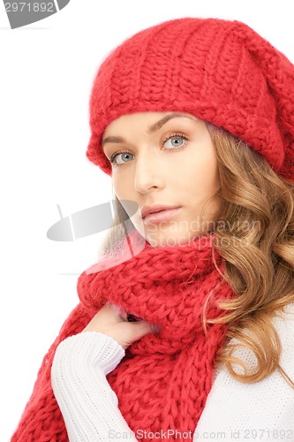 Image of smiling young woman in winter clothes