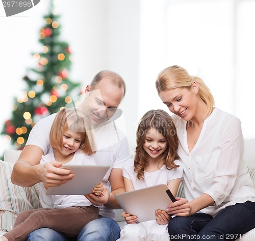 Image of happy family with tablet pc computers