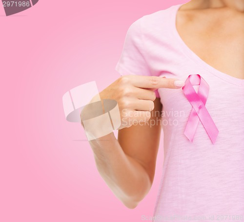 Image of close up of woman with cancer awareness ribbon