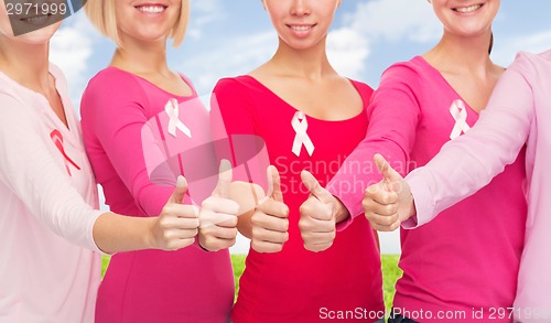 Image of close up of women with cancer awareness ribbons