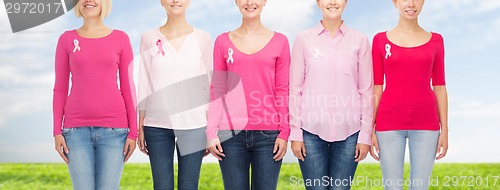 Image of close up of women with cancer awareness ribbons