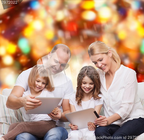 Image of happy family with tablet pc computers
