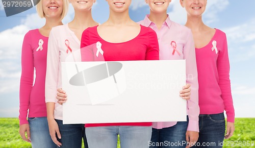 Image of close up of women with cancer awareness ribbons