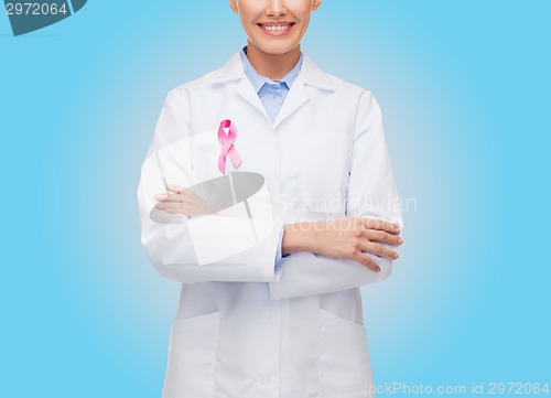 Image of close up of doctor with cancer awareness ribbon