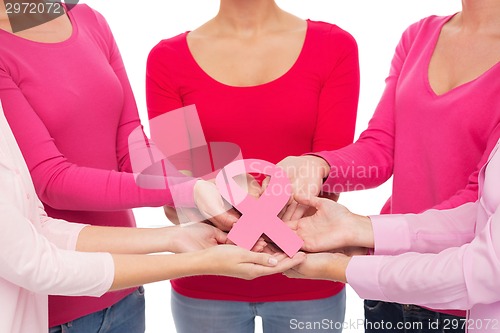 Image of close up of women with cancer awareness ribbons