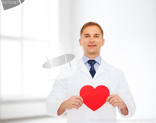 Image of smiling male doctor with red heart