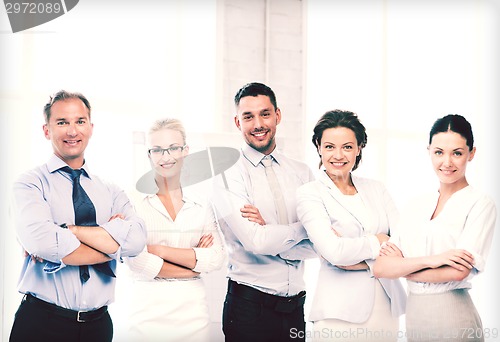 Image of happy business team in office