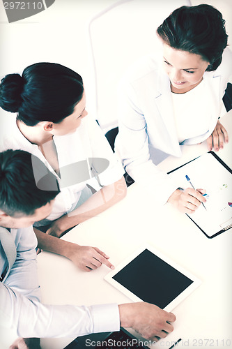 Image of business team having discussion in office