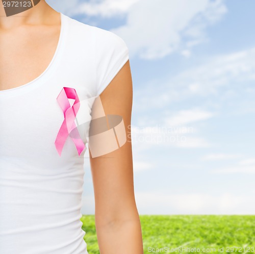 Image of close up of woman with cancer awareness ribbon