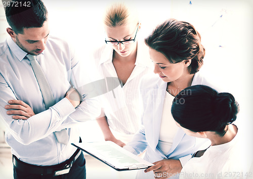 Image of business team having discussion in office