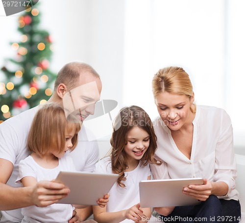 Image of happy family with tablet pc computers