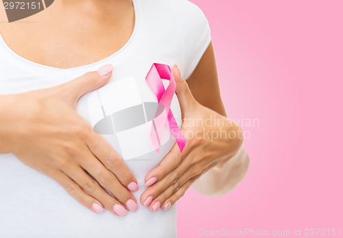 Image of close up of woman with cancer awareness ribbon