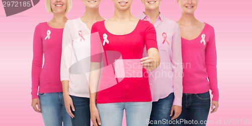 Image of close up of women with cancer awareness ribbons