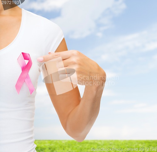 Image of close up of woman with cancer awareness ribbon