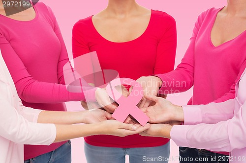 Image of close up of women with cancer awareness ribbons