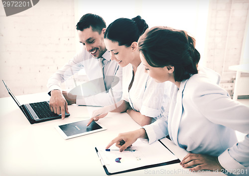 Image of business team working in office