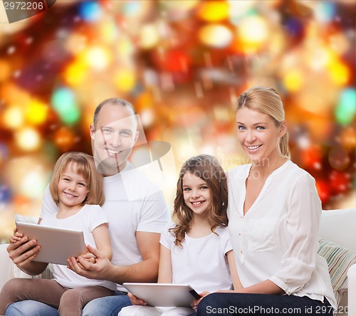 Image of happy family with tablet pc computers
