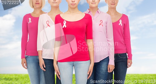 Image of close up of women with cancer awareness ribbons