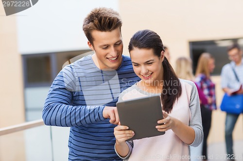 Image of group of smiling students tablet pc computer