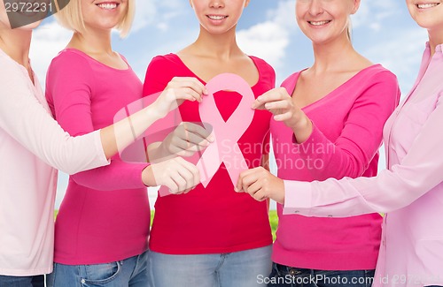 Image of close up of women with cancer awareness ribbons