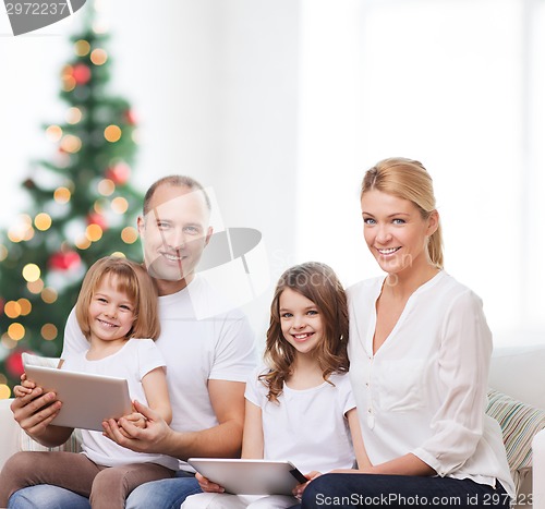 Image of happy family with tablet pc computers