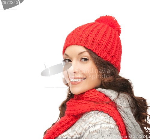 Image of beautiful asian woman in hat and mittens