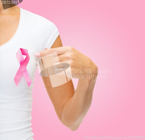 Image of close up of woman with cancer awareness ribbon