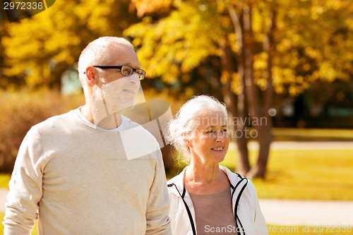Image of senior couple in city park