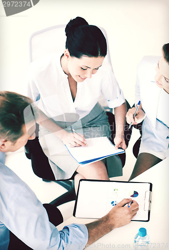 Image of business team having discussion in office