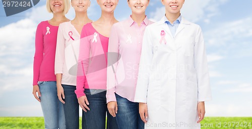 Image of close up of women with cancer awareness ribbons