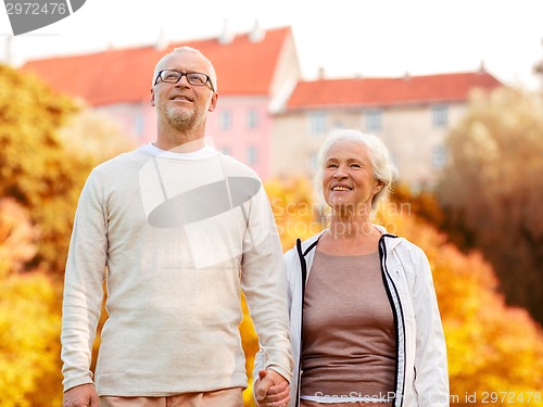 Image of senior couple in city park