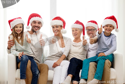 Image of happy family sitting on couch at home