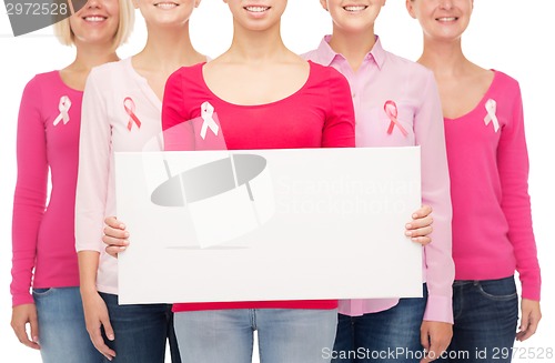 Image of close up of women with cancer awareness ribbons