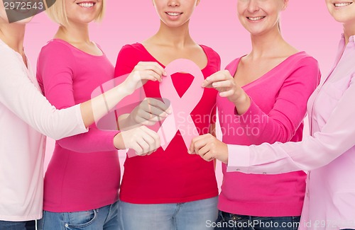 Image of close up of women with cancer awareness ribbons