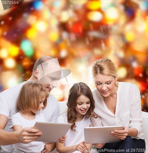 Image of happy family with tablet pc computers