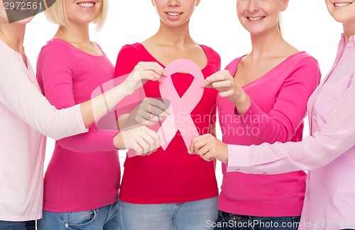 Image of close up of women with cancer awareness ribbons