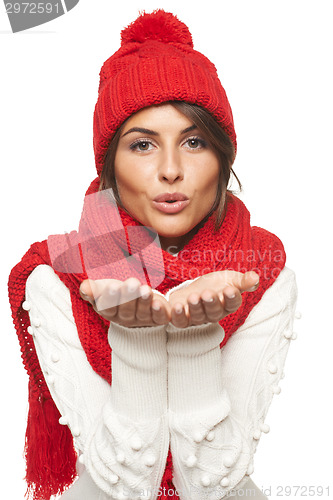 Image of Winter woman blowing a kiss