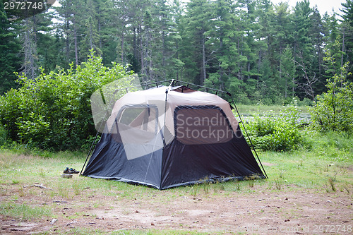 Image of Tent set up in the middle of wilderness
