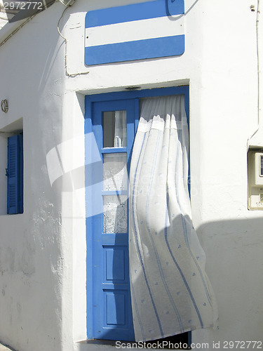 Image of Greek Island doorway with curtain Kimilos Greece