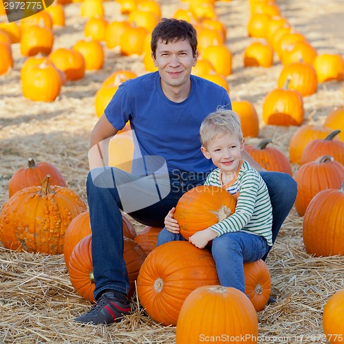 Image of family at pumpkin patch